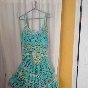 Handmade crochet dress in a peacock design